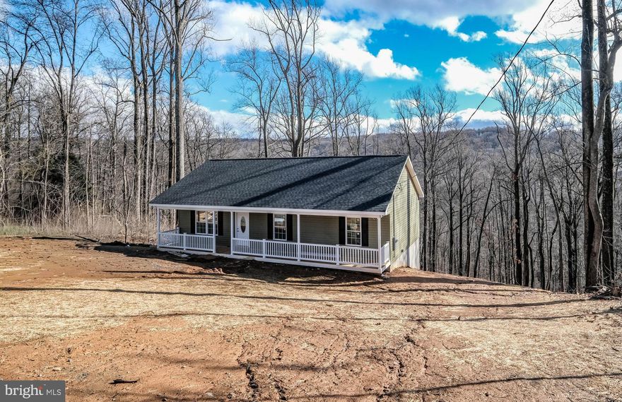Great mountain VIEWS and PRIVACY! New construction 95% complete (final grading, finishing touches and cleaning to be finished soon)! Private community LAKE access! Vaulted great room/kitchen/dining plus 9 foot high ceilings in full basement! Amazing builder-listing agent has sold more than 16 with this builder to thrilled buyers. This home is extremely upgraded w/ shaker cabinets, granite counters, luxury vinyl plank flooring in entire main level! BONUS 24x12 deck is included! Nestled on .84 acres in a dream location (near a wildlife management area with hiking, mountain biking, Appalachian trail access, multiple lake access and 1.5 miles from lovely winery). High speed internet is available.  This spacious home offers an open vaulted kitchen/dining/great room, stainless appliances (side by side fridge w/ water & ice in door, smooth top range), primary bedroom with oversized private bathroom, roomy guest bedrooms (12x10), ceiling fans in great room and all bedrooms, satin nickel hardware throughout, double sinks in both bathrooms, oak railing to basement, full covered front porch, full 9 foot high unfinished basement w/ windows and rough in plumbing (walkout w/ pad outside door), architectural shingles, low-E energy efficient double hung windows (with window sills), four motion detector flood lights, front and rear hose spigots, painted exterior foundation to match siding,  and more! SEE DOCUMENTS SECTION on the MLS listing for SO MUCH info about the area and the home (including floorplan)  Enjoy the many recreation areas of SHENANDOAH FARMS:  Farms Riverview Boat Landing ● Farms River Road Rec Lot ● Lake of the Clouds ● Spring Lake ● Shenandoah River Lane Rec Lot ● Treasure Island ● John “Junior” Shipe Park ● Venus Branch Bus Stop Park ● Shenandoah Farms Community Center   Call agent for glowing references from the happy 16+ buyers and agents we just closed with--the builder is FANTASTIC! Happy to set up a ZOOM call to "meet" him or meet at the property!
