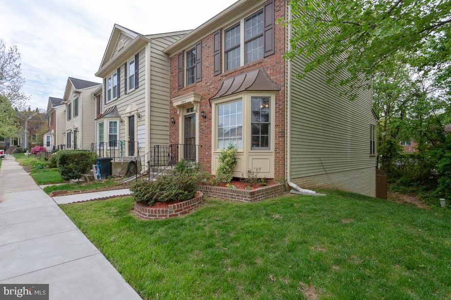 Elegant End Unit Brick Front Town home located in Lorton!  This 3 level home boasts Granite, Stainless steel,  front Kitchen with gas cooking, separate Dining, and Living areas! Lots of light and backs to trees located in culdesac**Walk out Basement**Modern, Updated baths**Hardwood Foyer, Living & Dining; walkout to deck from Dining Rm. Hardwood steps w/runner, Brick Patio and fully fenced yard! Lower level Family Room has wood burining Fireplace.  This home is in ideal Location  close to shopping and Interstate 95 and VRE  LortonTrain station*****all  in walking distance***Don't let this opportunity pass you buy***