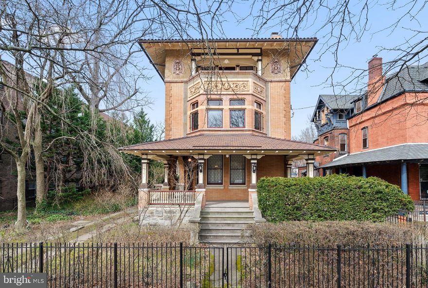 The historically significant Buzby House is an incredible single detached “Renaissance Revival” style Victorian residence built in 1895, located in the Cedar Park neighborhood of University City, West Philadelphia. Custom-designed for its original owner (architect info & copies of original plans are available), it has been occupied by only four families in its 127-year history and has been carefully preserved, restored and upgraded. There are 6-7 bedrooms and 3 full and 1 half bathrooms. Beautiful period details are everywhere in the spacious 6623 square foot interior:  oak flooring with decorative borders in the open main stair hall with its window bench and an upholstered seat on the stair landing, handsome wide original front and rear staircases for all three floors. Old growth quartered oak dining room floor, period woodwork and pocket doors. Two fireplaces with ornate mantles, one with a large gilded over-mantel with mirror.  Elaborate cast iron radiators, leaded glass. Original coved plaster ceilings on the first and second floor and a tin ceiling in the second floor front parlor which also features a large mid-20th C. wood burning fireplace.  The expansive main bedroom suite includes a separate dressing room with full-sized closets, a reading room, and a handsome 2021 bathroom. A third floor balcony off the original Billiard room looks out to Chester Ave. through the four mature Honey Locust trees providing privacy from the street.  The Pompeian brick exterior features original terra cotta bas reliefs and cornices. 

The owners have completed a faithful exterior restoration, with spectacular attention to detail thanks to their access to especially talented restoration professionals. The house is on an approximately quarter acre fenced lot in an irregular shape, with about 72’ of frontage along Chester Ave. Mature Cypress trees provide privacy at the wide side yard, with a driveway that will park up to 3 cars side-by-side, and a single-car detached garage provides storage space only. A recently rebuilt rear deck overlooks the huge, newly-fenced rear yard. The prior owner changed the zoning to 2-family in 1978 and the property contains an efficiency apartment with a private entry, but this unit is not currently licensed or rented.

The location is just four blocks from Baltimore Ave., University City's "main street," with eclectic shops and restaurants serving many different cuisines. Clark Park is 3 blocks away; Cedar Park is 5 blocks away, and a short walk takes you to USciences (now part of St. Joseph’s University) and/or UPenn.  The #13 Chester Ave. trolley stops at the corner and will whisk you to center city in 15 minutes, with stops along the way at UPenn, Drexel, and the 30th St. transportation hub in case you want to catch a train.