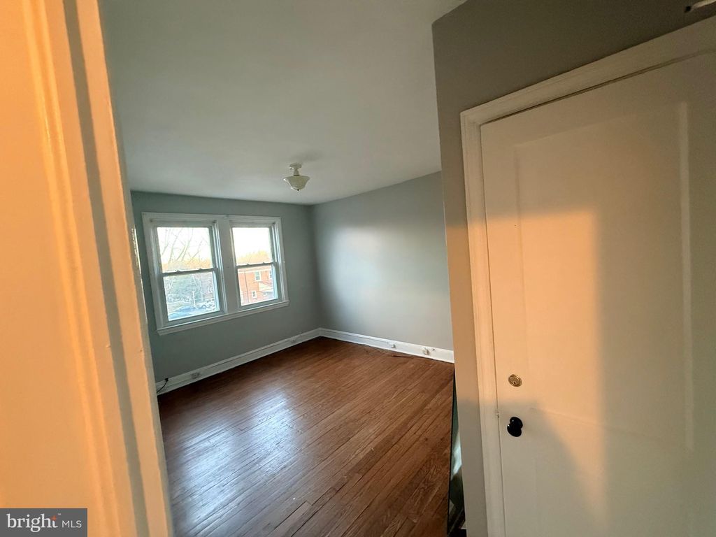 Photo of 829 N Chapel Gate Lane, BALTIMORE, MD 21229 (MLS # MDBA2194066)