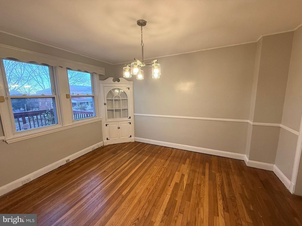 Photo of 829 N Chapel Gate Lane, BALTIMORE, MD 21229 (MLS # MDBA2194066)