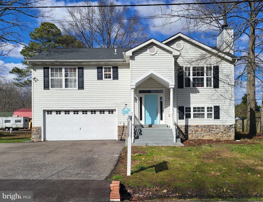 Welcome to this SPLIT-FABULOUS home with a spacious and open split entry way. Located in Parker Creek View where you can enjoy your evening or morning stroll through a private neighborhood built along Parker Creek. ROOF  & HVAC updated 2018. The finished basement includes a half bath and could become this homes 4th Bedroom. Featuring a two car garage that already has "man cave" written all over it for those entertaining weekends. The driveway can fit extra cars and features it's own lined basketball court. Granite counters, wood burning fireplace, spacious back deck, DON'T MISS THIS HOME!!!