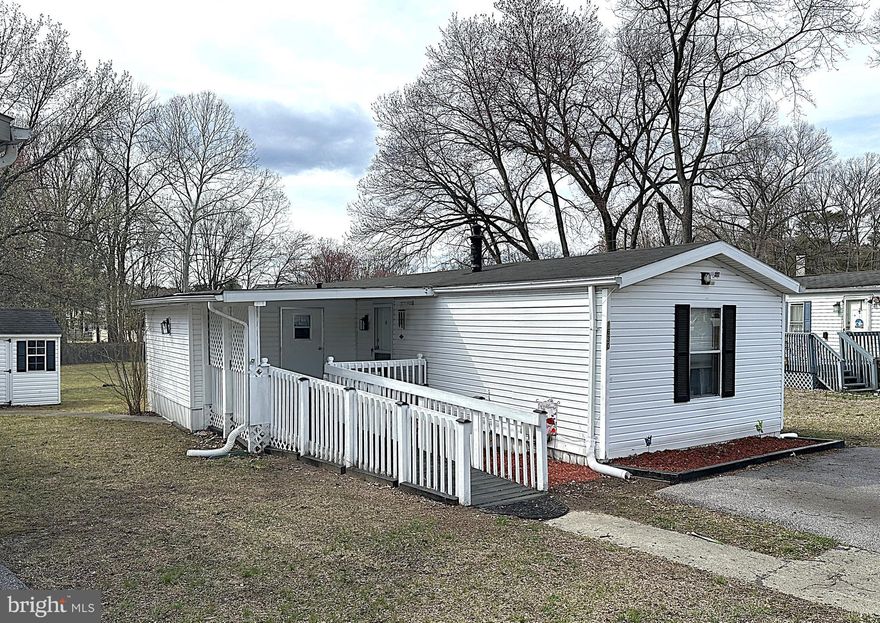 Affordable Senor Living and Ready to Move in a Great Location! 2 Bedroom, 2 Full Bath Single Wide at Sought After Bells 55+ Mobile Home Park. Over 900 Square Feet of Living Space with an Open Floor Plan. Inside you have a Large Living Room with Laminate Wood Flooring, a Big Eat-in Kitchen, Primary Bedroom with a Private Bathroom, Corner Garden Soaking Tub and Separate Shower. There is a Bonus 10 X 10 Addition that can be used for Storage or can be Finished and Converted into an All- Seasons Room. Outside is Nicely Landscaped and Features a Handicap Ramp, Custom Front Sundeck, Two Car Driveway and a Secure Storage Shed. This Home does need some Minor Updating and is Being Sold As-Is. Close to Shopping Restaurants, Fort Meade, MARC Train Station, Rt 32 and 97. Don't Delay, this one Won't Last!