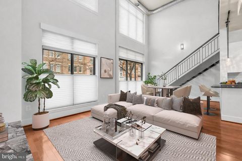 Photo of 520 John Carlyle Street #108, ALEXANDRIA, VA 22314 (MLS # VAAX2054656)