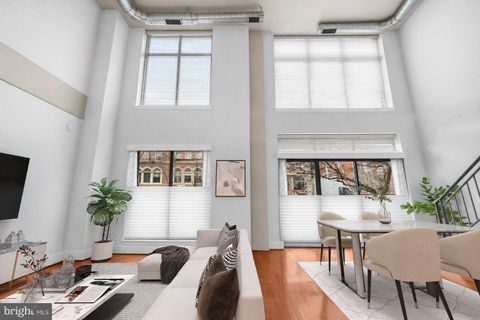 Photo of 520 John Carlyle Street #108, ALEXANDRIA, VA 22314 (MLS # VAAX2054656)