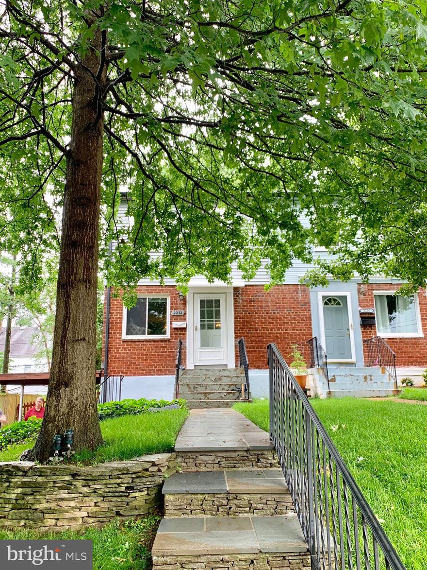 Lovely 2 bedroom/2 bathroom home in Bucknell Manor. Fenced in spacious backyard, well maintained front yard. Gorgeous hardwood floors in living room/dining room. Built in table in dining room (chairs not included). 2 bedrooms on upper level have hardwood floors. Lower level finished family room with carpet, built ins, full bathroom and laundry. Driveway parking with a carport.