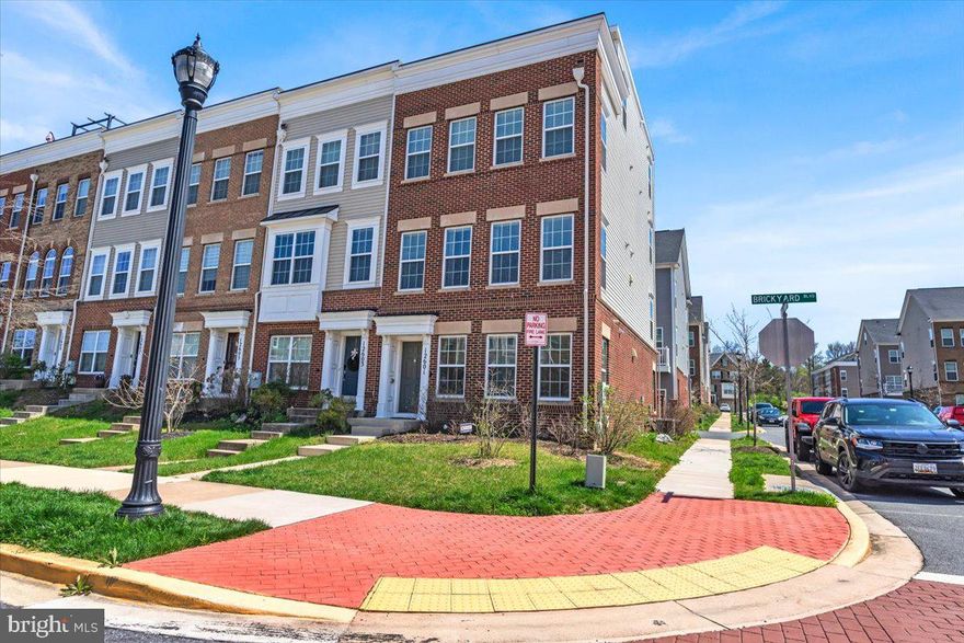 Welcome to the beautiful community of Brickyard Station! This lovely and well maintained end unit townhome is a "honey stop the car" kind of home. This gorgeous 4 level townhome features 3 bedrooms and 3 full and 2 half bathrooms. Plenty of room to stretch out with a den on the lower level as well as a bonus loft area on the top level with roof access to a semi-enclosed rooftop deck with lovely views - perfect for grilling, entertaining or watching fireworks! This home features a combination of carpet and hardwood flooring in the main level areas with ceramic tile in the bathrooms. The gourmet kitchen has a large island that can seat up to 5 people comfortably as well as a large and bright separate dining room. The living room includes a chandelier/fan combo and an in-wall gas fireplace that can heat the whole house - not to mention its beautiful to look at. The living room also has a patio on the rear of the home. The master bedroom has a walk-in closet as well as the second bedroom and laundry on the bedroom level. This home has all the bells and whistles and has been very well cared for. The Community features a rentable clubhouse, pool, fully equiped exercise room, 2 playgrounds, 2 walking lakes, benches and jogging and walking trails! Conveniently located in walking distance to the Murkirk Marc station as well as walking distance to a nail salon/spa and coffe shop/cafe on the same street at the front of the community. To say this community has it all is an understatement! The community also does events for the residents, organized by neighbors such as family fun days and weekly food trucks for the community during the Spring and Summer months. Come tour this beauty before its gone. This one won't last!!