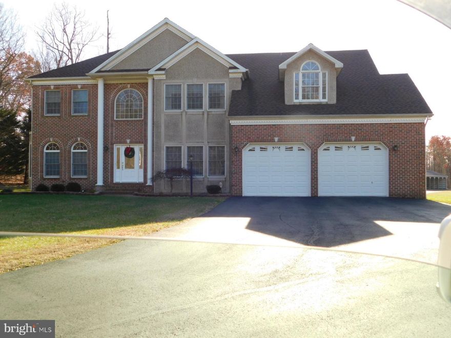 Custom built brick & stucco colonial on 39.97 acres, most of it in Forest Conservation.  The home features 4 bedrooms, 2 Full and 2 Half bathrooms,Large master suite w/ jacuzzi, sitting room with gas fireplace & 3 walk in closets.  Formal Living Room, Separate Dining Room, Gourmet Kitchen.  Family Room with gas fireplace and Game Room with large wood burning fireplace. Finished Basement with pool table. Covered rear porch overlooking open field and woods.   Detached 28x30 garage with finished loft, 28x44 building with heated shop, 32 x 60 pole barn, stocked pond, and riding trails thru-out.  Many, many recent updates!!!  2022:  New HVAC units, new garage door openers, new washer & dryer, Refinished wood floors on main level.  2021:  New roof (50-yr shingles), New garage doors, New roof over rear porch, New pole barn, New flooring in MBR and second floor hallway.