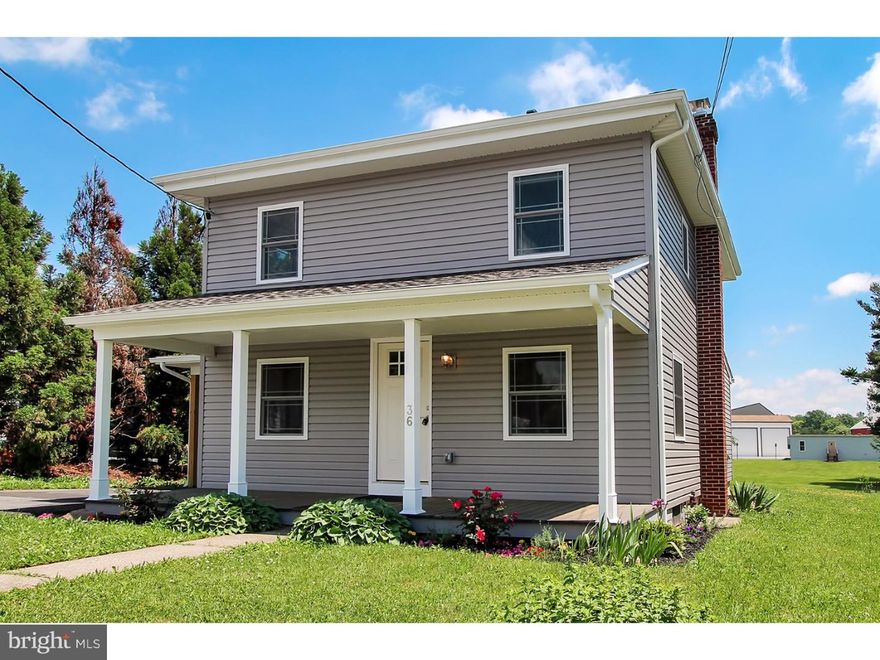You must see this beautiful home!  Everything has been replaced from top to bottom!  Let's start with the outside, where you will find new vinyl siding, new roof with 40 year shingles, refinished front porch, new windows, new front and rear exterior doors, a recent addition in the rear of the house that allowed for a main floor laundry room and powder room, and a refurbished carport that is now high enough for larger vehicles.  Inside you will fall in love with the brand new kitchen and granite countertops, new stainless steel appliances, recessed LED lighting, and quality wood cabinets with soft close drawers and under-cabinet lighting.  The main floor laundry room also includes brand new front load washer and dryer.  Upstairs you will find 3 bedrooms all with overhead lighting and lighted closets, as well as a completely remodeled spacious bathroom with double sink vanity granite countertop.  You will also appreciate the fine touches including solid wood natural finish doors, a widened hallway and open stair entrance.  Then in the walk-out basement, you will be equally impressed with the 2-zone new heating system and a new electric panel that has been updated to 200 amp electric.  Other great features of this home?  The living room and each bedroom is wired for cable, new well pump & water filter, new water heater, old copper and cast iron lines have been replaced & a PEX manifold has been installed, Delta faucets & shower fixtures, and new stainless steel chimney liner.  For all intents and purposes, this is a BRAND NEW home!  Another bonus is the large backyard.  Call today for your private showing.