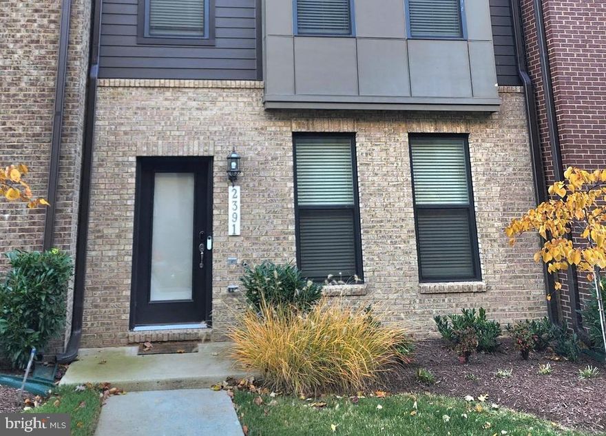 Move-In ready practically Town-home offered the best value.  Located in the Prime location; close to the best shopping center for dining and  entertainment.  Immediate access to the Dulles Access Road, Innovation Center, and Dulles International Airport. 
The home features 3 bedrooms, 2 full bathrooms, 2 half bathrooms. The lower level features a spacious 2-car garage, a half bath and a closet,  perfect to guests or a tucked away home office. As you go up the stairs, a stunning main level opens up flowing from the family room to the kitchen and dinning room.  It features soaring 9+ feet ceilings and luxurious  7' tall windows that flood the home with natural light. The open concept layout is  anchored  by stunning oak LVP floor and a chef's dream kitchen with the over size massive 12 feet quartz countertops; perfect to prepare meals for your family or guests at the center of attention when entertaining.  Step out onto the spacious deck for outdoor dining or peaceful relaxation. Your primary en-suite features a private bath with separate vanities and oversized walk-in show, and a walk-in closet.