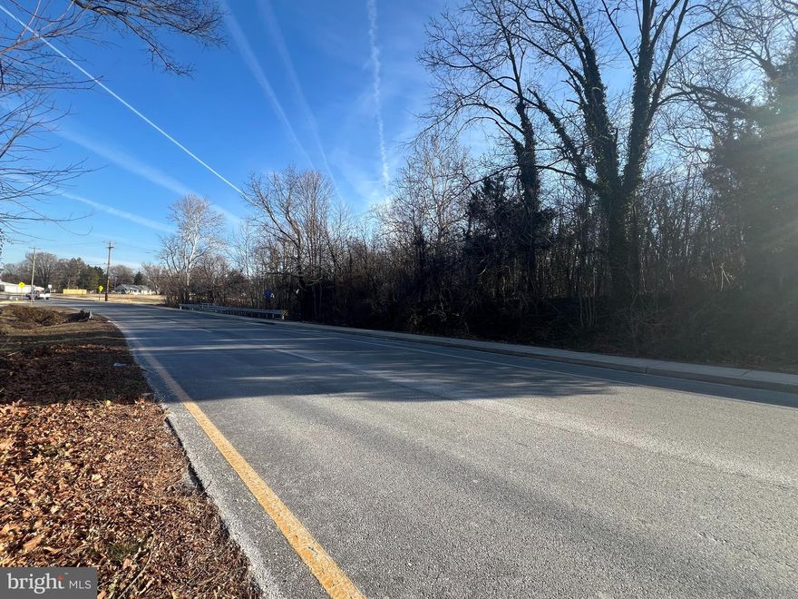 1.9 acres located in the Town of North East, Maryland!   This unique lot offers convenient access to downtown North East, with all of its charming shops and restaurants that are only a short walk from home.  Don't forget the waterfront, North East Park for walking, picnicking, fishing, and watching fireworks in the summer with a short walk home!  Located with in the town limits this property offers 1.96 acres of seclusion and privacy. Town living in a country setting! Imagine your new home or possibly your new home and cottage business and all the beauty of nature including a beautiful stream, while still in the amazing town of North East! This is is truly a one of a kind opportunity!  Public water and sewer hook up are available for this property, so no well drilling and septic approval hassles to go through.  Don't miss your opportunity to build your dream home on this property.