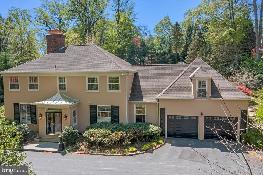 Step inside your dream home! This elegant French Colonial house, situated on the desirable north side of Bryn Mawr, is a true gem that offers generous living space for families of all sizes. Boasting five expansive bedrooms, four full bathrooms, and two half bathrooms, this home is designed with sophisticated living in mind. The classic French Colonial architecture emanates charm and refinement, with exquisite attention to detail at every turn, from the gleaming hardwood floors to the elegant molding and trim. Natural light pours into the spacious interiors through large windows, creating a bright and welcoming atmosphere that is perfect for both relaxation and entertainment. The kitchen and bathrooms have been beautifully renovated with timeless finishes, including top-of-the-line appliances such as a Sub Zero refrigerator and Thermador double ovens and cooktop with downdraft ventilation. With ample storage and plenty of counter space, this kitchen is a chef's dream. The three cozy gas fireplaces create a warm and inviting ambiance on chilly nights, while the large finished basement provides additional living and recreation space, as well as a wine cellar and plenty of storage. The expansive backyard and flagstone terrace offer the perfect setting for outdoor entertaining, with a charming potting shed that can serve as a gardener's haven or a playhouse for children. Located in one of the most sought-after neighborhoods in Bryn Mawr, this home is conveniently located near top-rated schools, shops, restaurants, and commuter rails, making it an ideal choice for those who value convenience and style. Don't miss out on the opportunity to make this stunning piece of real estate yours - schedule a viewing today!