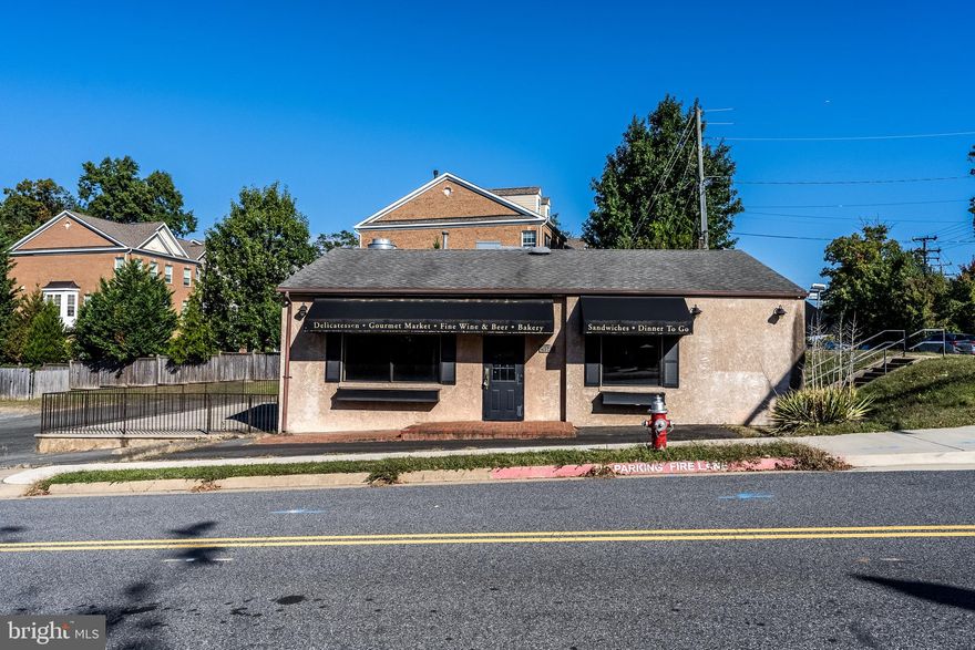 Seize the opportunity to own a high-visibility, free-standing commercial building in one of Fairfax City's most dynamic corridors! Located directly across from George Mason University and nestled within a thriving residential and retail community, this property offers unmatched exposure to both pedestrian and vehicle traffic.  Nearly 2000 sq. ft. with unfinished, dry basement ideal for storage.  Generous lot with approximately 30 parking spaces. Potential for expansion and includes existing patio or beer garden.  Versatile flexibility for retail, convenience store, casual dining, drive through, or service-based business. Previously used as a deli/convenience store.  Easy access from major roads and surrounded by pedestrian neighborhoods and the city’s vibrant residential development that's growing.  Whether you're launching a new concept or expanding an existing brand, this property offers the visibility, flexibility, and location to make your business thrive.  Building is as-is.  The true value lies in the 20,100 square foot lot and location.