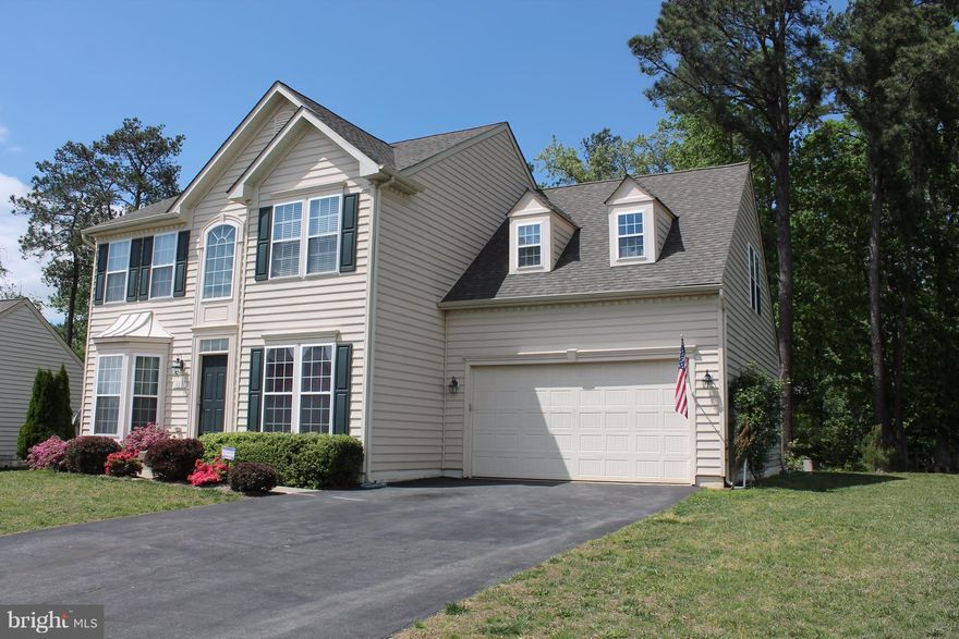 Large 5 bedroom home with a den. Main level includes a family room, morning room, formal dining & living rooms, hardwood floors, laundry room & gourmet kitchen.  Basement features a rec room, large storage area, 5th bedroom, & rough in for 3rd full bath.  Lot backs to trees for privacy.  Home warranty included.  Price has been reduced and sellers are ready to go.