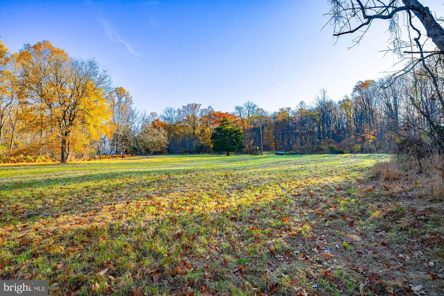 This level 5 acre lot offers an opportunity to build the home of your dreams on history’s doorstep in Williams Township.   Off of a winding country road in an area rich in history,  folklore and rural beauty the lot is across from a 76 acre preserve with a trail loop and some of the oldest exposed rocks in the United States.   The preserve is home to a unique variety of plants and animals.
An open meadow in the front of the lot and mature woodland borders offer a rural setting yet the location is minutes from Route 78 in Easton, the New Jersey Border and Bethlehem.    Rural, beautiful, easily accessible and surrounded by cultural delights and history, this homesite is a rare opportunity.