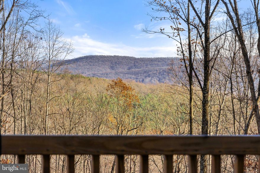 New roof! and gutters on house.  If you're seeking privacy combined with breathtaking views, this property is the perfect fit for you! Just a short drive to the charming town of Marshall, Virginia and conveniently located near Route 66. This unique home is nestled within the foothills of the Blue Ridge Mountains on Quail Run Mountain and boasts recent updates in both the kitchen and two of the bathrooms, ensuring modern comforts. The kitchen features an oversized island, white shaker cabinets and floating shelves. The hall bath has lovely features such as a freestanding tub, beautiful vanity with marble countertop, rose gold faucets and a shower with rain shower head. This property is already equipped with multiple outbuildings providing plenty of opportunity to have chickens, ducks, and other small farm animals.
Embrace the tranquility of country living while still being close to local amenities, don't miss out on this awesome opportunity!  The home comes with Starlink equipment for internet.