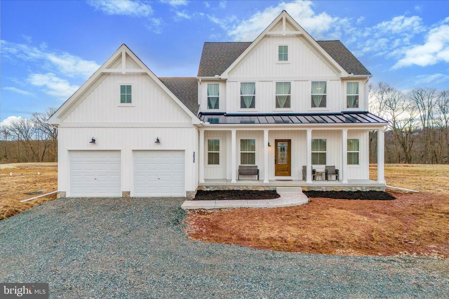 Discover the perfect blend of rural tranquility and modern luxury at 3035 Oak Creek Lane, an idyllic farmhouse nestled on an expansive 21.83-acre estate. Crafted by Keystone Custom Home Builders in 2023, this brand-new 2,841 square-foot residence promises a lifestyle of sophistication and comfort, surrounded by the natural beauty of flat, cleared land with views of rolling fields and beautiful trees among the landscape. Approaching the residence, a covered front porch welcomes you into a home defined by timeless elegance. A classic two-story foyer that sets the tone for the entire home. Through French doors to the right is a private office offering views of the sprawling front yard. A formal dining room awaits to the left of the foyer, perfect for hosting memorable gatherings and celebrations.
At the heart of the home is an inviting gathering room featuring a stunning stone fireplace that serves as the focal point of this warm and welcoming space. This room seamlessly connects to the well appointed kitchen with all the modern conveniences sought after by discerning homebuyers. A breakfast room off the kitchen features sliding glass doors that step down to the back yard. Large windows create picturesque views of your vast estate and flood the space with natural light. Completing the common living spaces on the first floor is a powder room and a laundry room with direct access to the garage. Beyond the rear living spaces is the primary bedroom suite. Enjoy two walk-in closets, a stunning bathroom with dual vanities, a soaking tub, oversized glass enclosed shower, and a private water closet. French doors from the main bedroom lead to the private expansive backyard. Heading to the second floor, at the top of the stairs is a welcoming living space. This flexible room could serve as a den, office/study, exercise room, or it can easily be enclosed to create a 5th bedroom. Three bedrooms, a spacious full bathroom, and a linen closet complete this level. The lower level of the home is unfinished, plumbed for a full bath, and wired for electric. Systems, mechanics, plumbing, wiring are all clearly labeled for the next owner. Outside of the home you can explore the vastness and beauty of the grounds. The sprawling acreage provides endless possibilities, whether you envision cultivating a thriving garden, establishing an equestrian paradise, or simply relishing in the serenity of your private retreat. The location is strategically chosen, offering easy access to major roads and placing you in close proximity to Philadelphia's dynamic cultural scene and the thriving equestrian communities that surround the area.3035 Oak Creek Lane is not just a home; it's an invitation to embrace a lifestyle that combines the charm of farmhouse living with the conveniences of modern living. Don't miss the opportunity to make this exquisite property your own and embark on a journey of refined country living, where every day feels like a retreat and the possibilities are as boundless as the beautiful Pennsylvania landscape surrounding you.  Building plans and specs are available. The home comes with a 20 year structural home warranty. Owners obtained an NPDES Permit which is necessary to build a barn, fence, or other structure. The permit expires in June and can easily be renewed by the next owner if they need more time. The entire driveway will be paved once weather allows.  The address is not available in GPS. The property is located between 3002 and 3004 Congo Road, East Greenville. Showings begin Sat 2/10.