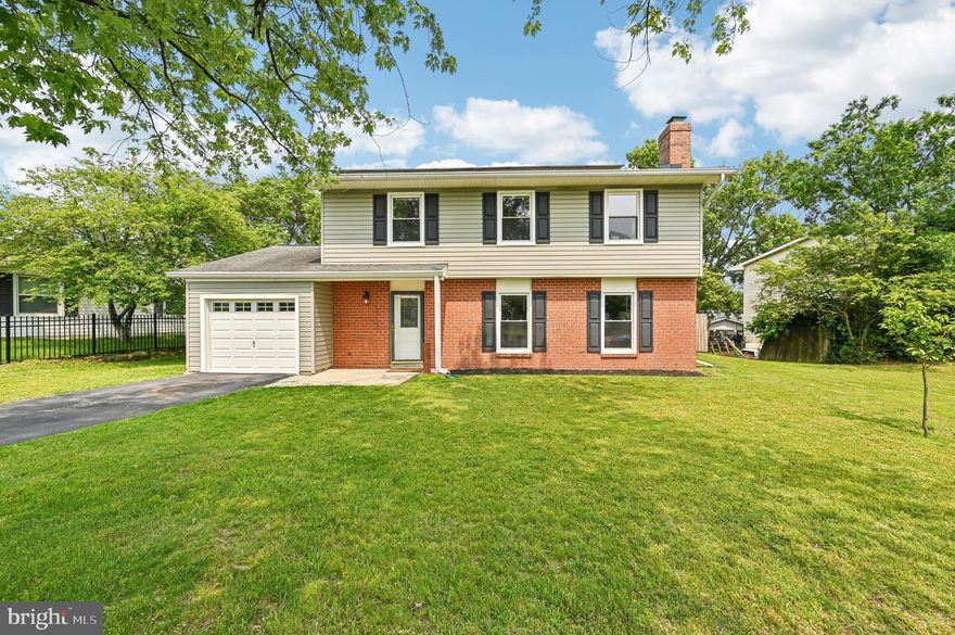 Welcome to 7895 Bastille Place, Severn, MD 21144 — a beautifully maintained traditional-style brick detached home featuring four spacious bedrooms, two full baths, and one half bath. Inside, you'll find solid hardwood floors throughout, central A/C for year-round comfort, and an attached garage providing convenient parking and storage. This home offers a blend of classic charm and practical living. VA assumable loan available for qualified buyers. Conveniently located near major commuter routes, shopping, and dining options. Don’t miss this opportunity!