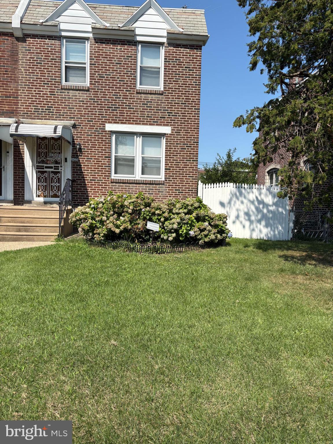 Welcome to 1103 Fanshawe Street located in the heart of Lawncrest. This beautifully maintained twin home is move-in ready and sits on an oversized lot, in a desirable location. Enter through a covered doorway and into a spacious Living room with beautiful hardwood floors which overlooks the front yard and into an arched formal Dining room with great windows. From there you'll see a bright eat-in kitchen with tons of beautiful cabinets and open shelves, stainless steel appliances, decorative backsplash, a custom nook with wine storage and a convenient counter space for kitchen stools. Enjoy your year-round comfort with central cooling and heating throughout the home. Original hardwood floors throughout the main level with untouched wood floors beneath carpet on the stairs and second floor. Upstairs is a spacious primary bedroom with walk in closet and large windows, plus 2 additional good sized bedrooms and an updated full hall bath. Downstairs is a newly finished basement, ideal for a family room, home office or gym, play area etc, and laundry area with washer and dryer. Outdoors is an extra large back yard with a privacy fence for grilling, entertaining or relaxing, with a one car garage, a rare convenience for this area. Whether you're a first time homebuyer or just looking to settle in a special neighborhood, 1103 Fanshawe offers a great option. This home combines function, space, comfort and style. It's city living with a suburban feel. This home has many upgrades for those seeking a move-in ready home; New roof installed (2021 ) for added peace of mind, Basement refinished (2023), updated plumbing throughout. In addition, the location cannot be beat, It is minutes from 4 major supermarkets, great dining , the Cottman Mall and many public transportation routes. Also within walking distance to J Hampton Moore(Elementary) Castor Gardens (middle) and Northeast High School. Don't miss your chance to make this house your home. Schedule your showing today.