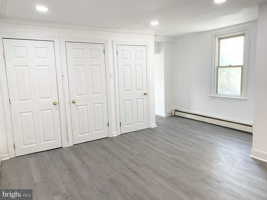 Welcome to 32 S Penn St. This spacious 1st-floor rear apartment offers comfortable living with a large bedroom, 2 entrances, ample closet space, and a parking spot! Enter from the rear Kitchen, or the side bedroom. The light cabinets and lots of windows offer plenty of sunlight. The Bathroom features a modern subway tile with a stand-up shower. Located just around the corner from the Baltimore Ave train stop, commuting is a breeze! You'll also enjoy the convenience of nearby shopping, with Lidl & Giant supermarket just minutes away, as well as Oakview Falls for some nearby outdoor relaxation. This is a 7 minute drive to Mercy Fitzgerald Hospital, and 15 minutes to the Springfield Mall. With its blend of comfort and prime location, this apartment is a great place to call home!