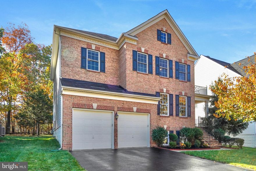 Open houses have been cancelled. We appreciate your interest.

Welcome to your dream home! This beautifully updated and well maintained 6-bedroom, 4.5-bath colonial masterpiece offers 3,600 square feet of luxurious living space, nestled on a no-through street in a serene neighborhood. Step into a grand foyer with a cathedral ceiling and stunning staircase. The open floor plan seamlessly connects the living and dining rooms, perfect for entertaining. The heart of the home is the gorgeous kitchen, featuring a new gas cooktop, new double wall oven, new dishwasher, and a new sleek backsplash. The center island, granite countertops, and hardwood floors complete this chef’s paradise. Enjoy casual meals in the breakfast area, which overlooks the lush, tree-lined backyard and leads to a newly resurfaced Trex deck—ideal for outdoor gatherings or relaxing evenings. You’ll enjoy the gas fireplace on the upcoming chilly nights in the adjacent family room. Upstairs, you'll find plush newer carpeting throughout the four spacious bedrooms as well as three well-appointed bathrooms. The expansive primary suite boasts a cozy sitting area, THREE closets, and a luxurious attached bathroom with a double vanity, soaking tub, and separate shower. The laundry room on this level is an added convenience. Need space for guests? The walk-out basement offers TWO additional bedrooms, a fantastic recreation room with a wet bar, full bath, and a second laundry room—perfect for hosting family or friends. This home is ideally situated in an established neighborhood with a low HOA fee. Enjoy easy access to shopping, dining, parks, and major commuting routes, including I-66, Rt. 28, and Fairfax County Parkway. Don’t miss the chance to make this exceptional home yours! Schedule a showing today!