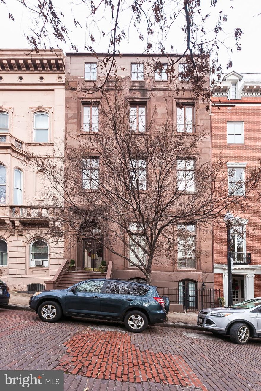 Spacious 1100 sqft condo w/FANTASTIC outdoor space on historic Mt Vernon Square, this grand brownstone w/ magnificent lobby awaits you. This terrace residence is sun filled from its many windows overlooking a secluded garden, securely sandwiched between the main TH and a sep carriage house. Perfect for entertaining-practical too, with many closets and storage areas. Newly installed wood laminate flooring, HVAC (Jul 2020). BR suite w/large dressing area/closets and priv bath.  Guest bath, foyer, kitchen with a pantry that will please any cook!  Steps to Peabody, UB, Penn Station, downtown. Enjoy the great cultural institutions and restaurants nearby.