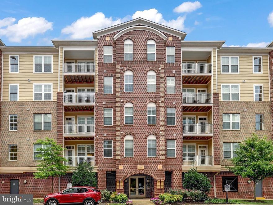 **Price improved** Welcome to this exquisite Discovery Square condo, a light-filled 2-bedroom, 2-bath gem on the 5th level with convenient elevator access. The open floor plan is highlighted by a gourmet kitchen featuring stainless steel appliances, granite counters, and upgraded cabinets. Enjoy the luxury of double sinks in the bathrooms, walk-in closets, and a spacious balcony perfect for relaxation. Additional perks include an assigned parking spot in a gated garage, ample storage, and in-unit washer/dryer. Ideally situated near Dulles Airport with easy access to I-66, Rt 50, and Rt 28, this condo combines modern elegance with unparalleled convenience.