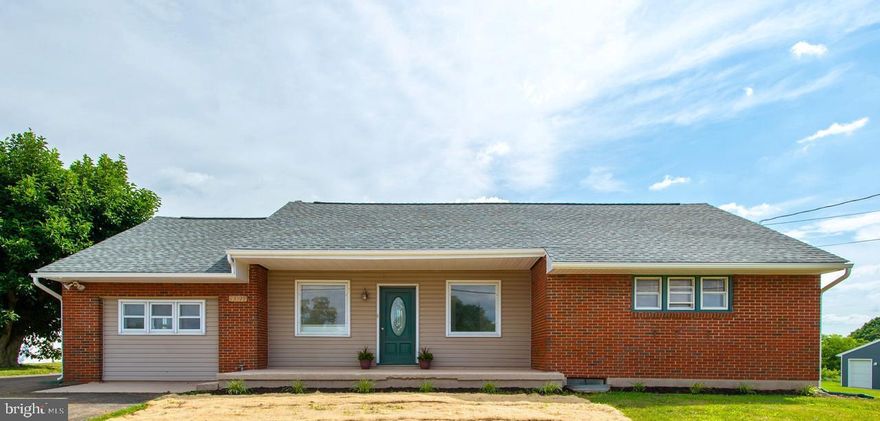 Unique country setting that backs to farm. 5 bedroom 3 bath rancher. In-Law Suite with a kitchenette, bedroom, bath, laundry, and cathedral ceiling! Upper level has a large owner suite and a private bath, basement has 1 bedroom and 1 bath, Main level  has 3 bedrooms and 1 bath with a separate entrance for the  in-law suite/studio apartment. Covered patio and Large parking area in back of house plus storage shed. New 50 year architectural roof added 1 year ago with new roof,  gutters with extended warranty. HVAC central ac with gas furnace only 5 years old. Carpeting and lvp flooring only 2 years old. Bathrooms all replaced except for one.