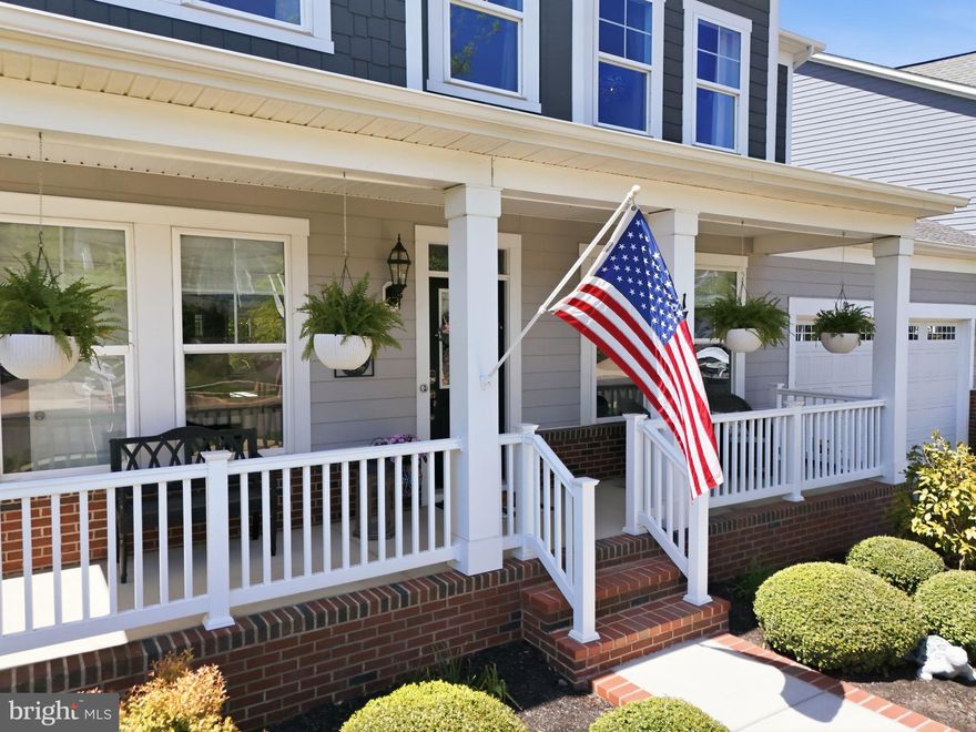 Now offered at $970,000! This beautifully upgraded Brookfield Brighton model offers the perfect combination of luxury, comfort, privacy, and location in sought-after Potomac Shores. Backing to protected trees with peaceful wooded views, this move-in ready 5-bedroom, 4.5-bath home truly stands out with over $75,000 in thoughtful post-build upgrades and exceptional pride of ownership throughout. From the moment you walk in, the home feels like a professionally staged model home—but it isn’t. Every space has been meticulously maintained and thoughtfully designed, creating a warm, elevated feel that buyers will immediately notice. The open and airy floor plan is filled with natural light and features wide plank engineered flooring across the main level, a stunning floor-to-ceiling modern fireplace, custom walk-in pantry, gas cooktop, double wall ovens, and an oversized kitchen island that opens beautifully to the family room and morning room. Step outside and enjoy one of the home’s best features—a large composite deck and screened-in porch overlooking the private tree line, creating the perfect space for morning coffee, outdoor dining, entertaining, or simply unwinding at the end of the day. Upstairs, the spacious primary suite feels like a private retreat with a sitting area, two walk-in closets, and a spa-like bath with soaking tub and oversized shower. The finished walkout basement offers incredible flexibility with a large rec room, full bath, and fifth bedroom ideal for guests, a home office, gym, or multigenerational living. Additional highlights include a finished two-car garage, mudroom, covered front porch, upper-level laundry room, and 5-zone irrigation system. Located just minutes from community trails, Potomac Shores Middle School, Covington-Harper Elementary, the Ali Krieger Sports Complex, and John Paul the Great High School, this home also offers access to the incredible amenities that make Potomac Shores so desirable, including pools, fitness centers, clubhouse, scenic trails, kayak launch, and the renowned Potomac Shores Golf Club featuring the Jack Nicklaus Signature Course and Tidewater Grill. This is the kind of home buyers wait for—beautifully maintained, loaded with upgrades, backing to trees, and located in one of Northern Virginia’s premier lifestyle communities.