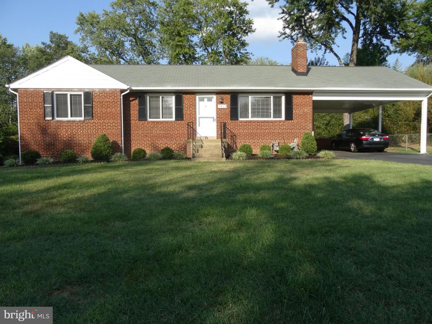 Location, location, location!!!  Less than 1/4 mile from the Beltway and Huntington Metro (yes, walk to Metro!), you will find this charming ranch style home in a very quiet neighborhood just north of Wilton Woods.  Huge lush private fenced yard on a dead end street greets you. Large 2- car carport keeps you. Never worry about bringing groceries in while it's raining again and never worry about maintaining this huge yard...lawn service is included! Step inside and find an efficient floorplan that includes a welcoming living room with large windows and plenty of natural light. Hardwoods or life friendly flooring is found throughout the main level. Adjacent to the living room is a spacious dining room, large kitchen with stainless appliances, and family room with vaulted ceilings overlooking the backyard. Enjoy the light airy feeling of this informal space!  Three spacious bedrooms and 2 full bathrooms complete the main level.Downstairs, you will find a charming recreation room space that works well for rambunctious toddlers, teens, the man cave, craft space or all of the above! You decide! You'll also find tons of storage in the adjacent utility room.   Enjoy this quiet pastoral setting minutes from everywhere. This home is superbly maintained by the meticulous local owners. Newer paint and large shed too. Better hurry!