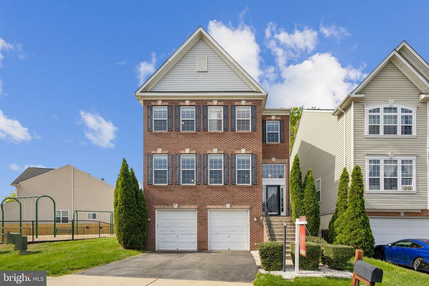 Looking for the perfect blend of space, style, and smart financial opportunity? This home,  an elegant, all-brick Colonial in the Eagles Pointe community, offers nearly 4,500 finished square feet across three thoughtfully designed levels. One of the standout features of this home is the assumable VA loan at an incredibly low 2.25% interest rate, a rare opportunity that can save a qualified buyer hundreds per month compared to current market rates.

Inside, you’ll find a flexible floor plan with four spacious bedrooms upstairs, and four-and-a-half bathrooms throughout, ideal for a variety of living arrangements. The finished basement includes a full bath, and extra room and a rec room perfect for casual entertaining. On the main level, the open-concept design connects the kitchen, dining, and family room seamlessly, making entertaining easy and everyday living more comfortable. A cozy fireplace adds warmth, while oversized windows flood the space with natural light.

The home’s curb appeal is enhanced by manicured landscaping, a stately front entrance, and a two-car garage and driveway. Out back, enjoy a private, low-maintenance, fully fenced yard with a trex deck that’s perfect for relaxing or hosting summer gatherings. Residents of Eagles Pointe love the walkable neighborhood setting with tree-lined streets, playgrounds, and walking paths. The location also puts you close to major commuter routes, shopping, dining, and both Quantico and Fort Belvoir.

This home checks every box—space, style, and serious savings. Schedule your tour today and learn how you can take advantage of the 2.25% assumable loan to make this home yours.