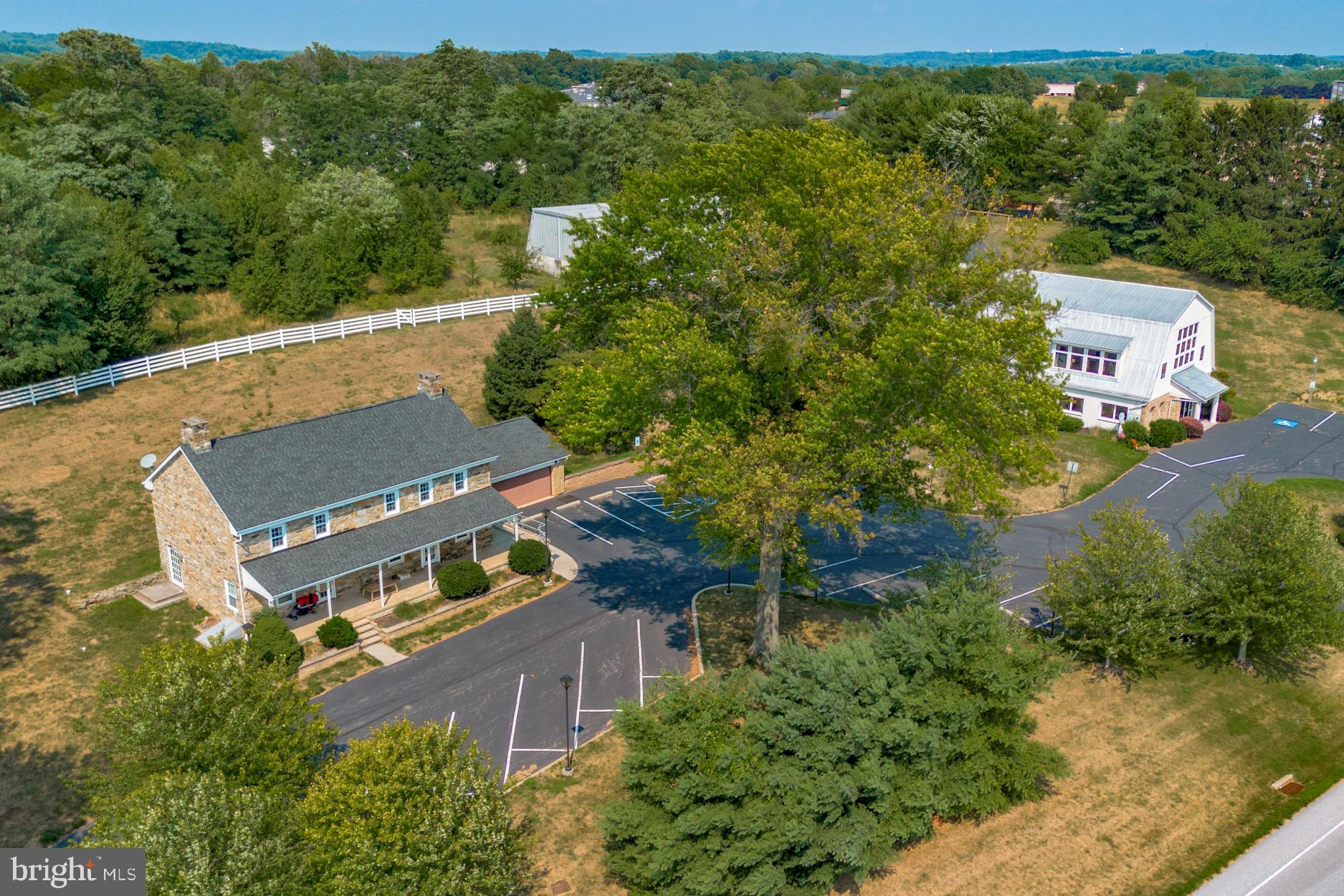 Presenting an exceptional investment opportunity with three distinct buildings on one expansive 7 acre lot. Together, the three buildings provide a total of 11,828 usable SF. Building 1, The Barn, offers 5,936 SF of versatile space, while Building 2, The Farmhouse offers 2,872 SF. Both the Barn and Farmhouse buildings are currently leased as a daycare, offering stable rental income. The third building is a Warehouse with a total of 3,020 SF, which adds further potential for expansion or diversification of this investment portfolio. With an impressive NOI per year and an attractive CAP rate, this multi-building property presents a compelling proposition.