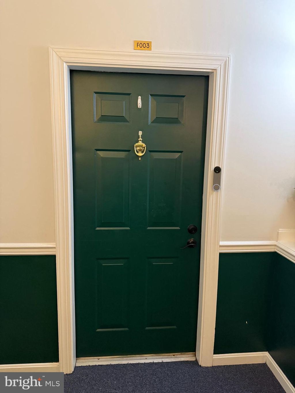 Photo of 3521 Piney Woods Place #F003, LAUREL, MD 20724 (MLS # MDAA2123672)