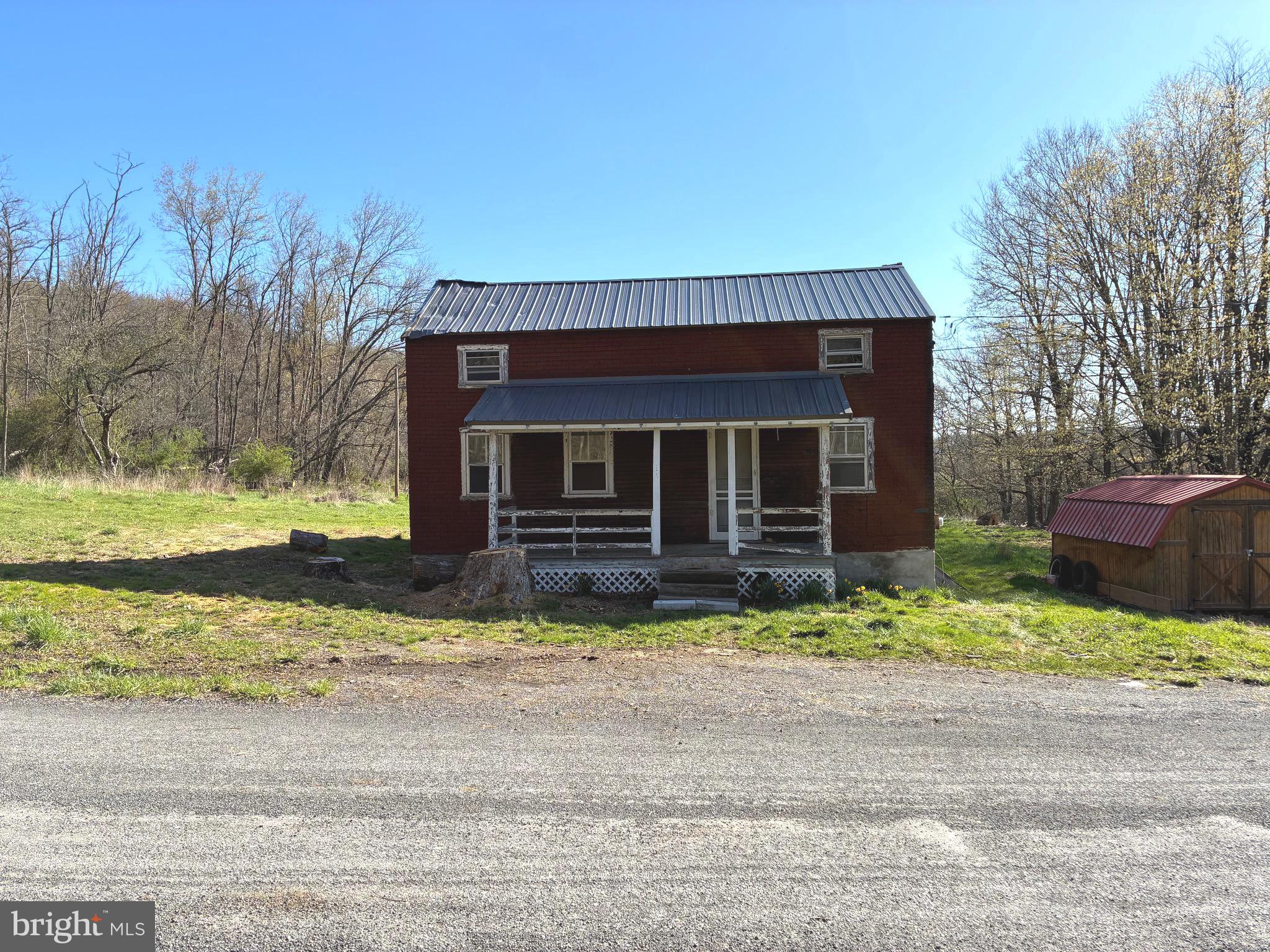 INVESTORS, looking for a fixer home with some acreage? Look no further!! Finish remodeling the current home or rebuild on 3+- acres! Currently has living, dining, kitchen, bath and 3 beds. Outdoor storage shed, new metal roof. Possibilities are endless here!