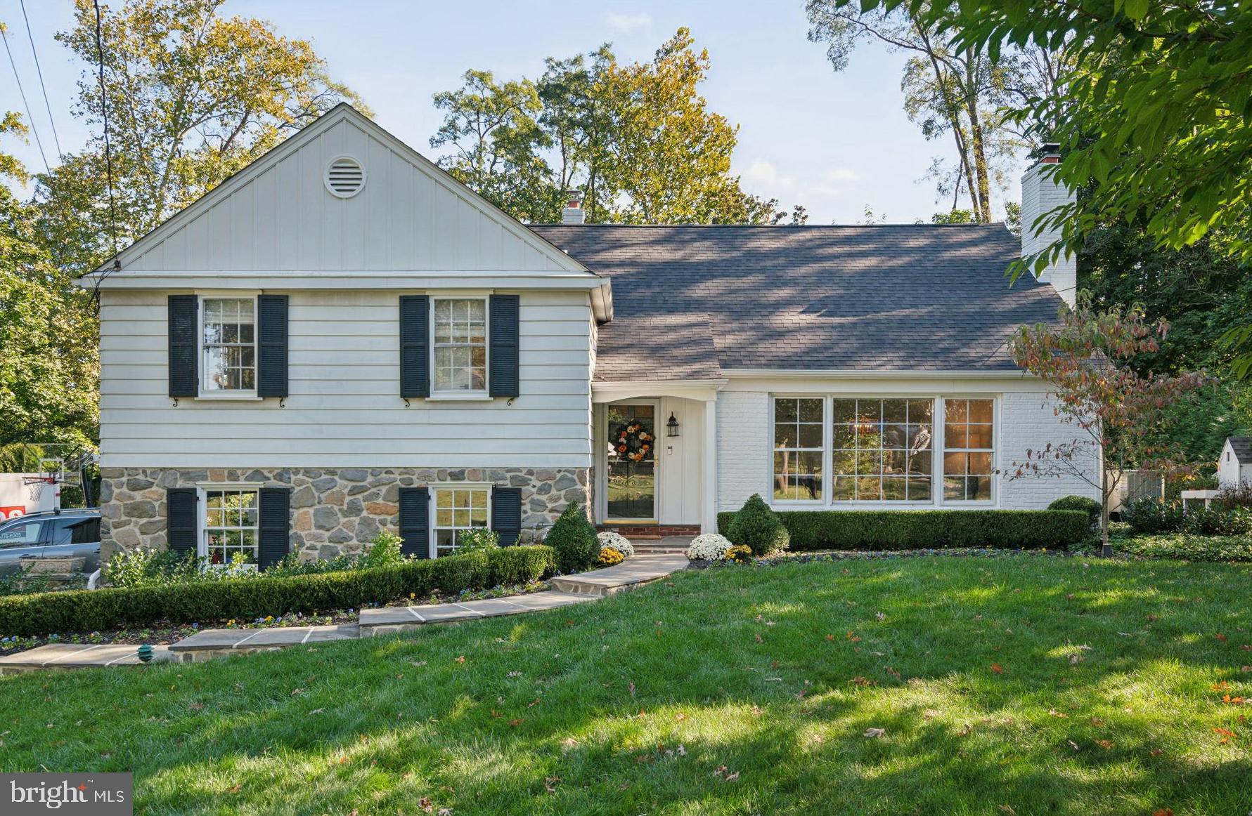 Welcome to 239 Hardwicke Ln, a beautifully updated single-family residence in the highly sought-after neighborhood of Villanova, PA. This delightful 5-bedroom, 3.5-bath home sits on a spacious, meticulously landscaped lot, offering light-filled rooms, newly refinished hardwood floors, modernized bathrooms throughout, and features a new roof, a new driveway, and new hardscaping.
As you enter the home, you are greeted by a welcoming foyer that leads to a generously sized living room, complete with large windows, a wood-burning fireplace, and built-in cabinetry. The spacious dining room features charming built-in corner cabinets and picturesque views of the private backyard. The well-appointed kitchen/breakfast area provide access to a stunning flagstone patio, ideal for outdoor entertaining. Just a few steps away, a cozy family room also opens to another inviting rear patio.
The lower level includes a convenient powder room, a laundry room, and access to the attached 2-car garage. Upstairs, you will find the primary bedroom suite with an en-suite bathroom and a walk-in closet, two additional spacious, bright bedrooms, a large hall bathroom, and ample closet space. Walk up to the top floor to discover two more bedrooms and another full bathroom, perfect for guests or family.
The exterior of this charming home is just as appealing as the interior, featuring an expansive yard, lush landscaping, and beautiful hardscaping that enhance the property’s curb appeal. Its convenient location is just minutes from area premier colleges and universities, train stations, high-end shopping and dining, parks, trails, and major commuting routes. With its unique charm and comfort, this property is a true gem.
