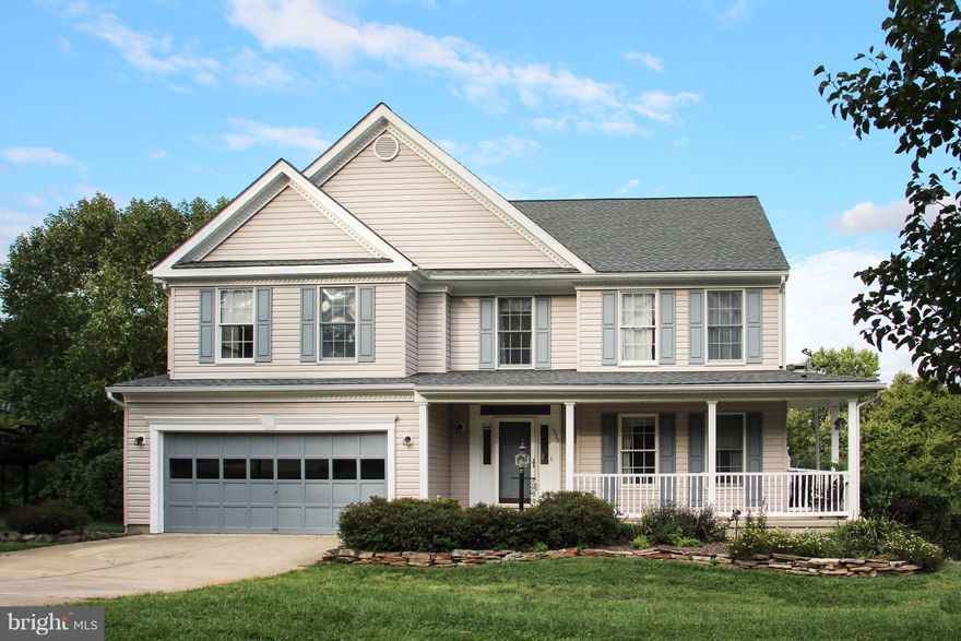 OVER 4200 SQ FT OF FINISHED LIVING SPACE IN THIS BEAUTIFUL 5 BR PORCH FRONT COLONIAL*FEATURING MAIN LEVEL BR, AMAZING UPPER LEVEL MASTER SUITE W/ LOFT & LUXURY BATH, RECENTLY REMODELED KITCHEN, SUNROOM ADDITION & FULLY FINISHED LOWER LEVEL W/ WALKOUT*OUTDOOR AMENTIES INCLUDE DECK, PATIO W/ FIREPIT & LARGE YARD BACKING TO TREES*ROOF IS ONLY 2 YRS OLD*SPACIOUS ROOM SIZES & NEW CARPET THRUOUT*NO HOA