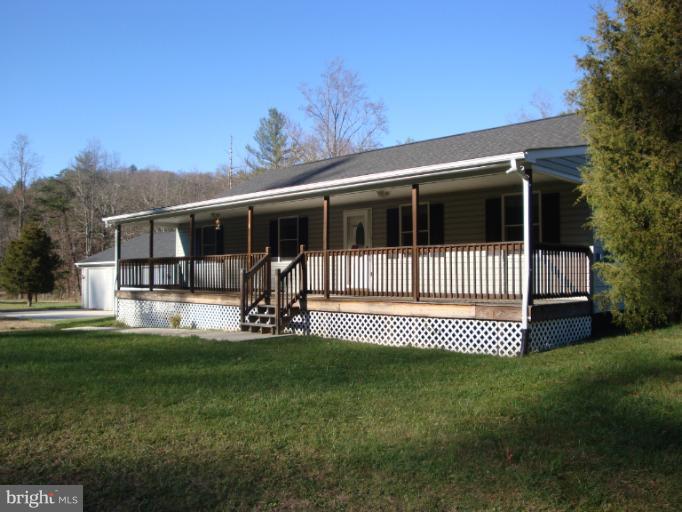 Spacious 3 BR 2 BA Ranch Home on 2 acres w/ 3 bay garage.Views of Capon Springs Creek.