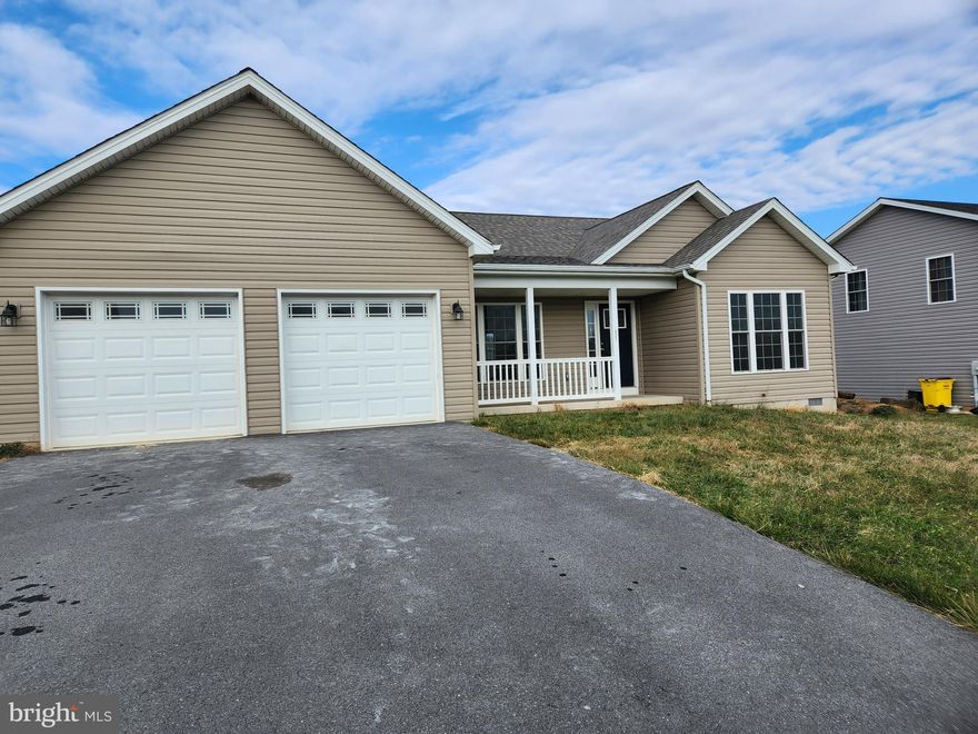 Beautiful rancher in Martinsburg features 3 bedrooms, 2 full bathrooms, open kitchen/living/dining room, laundry room w/washer and dryer, attached 2 car garage and nice yard.  Pets allowed on case by case basis.