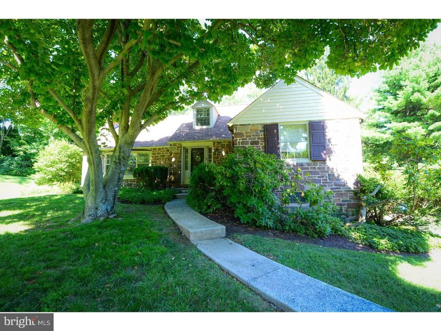 Super Meadowbrook 4 bedroom 2 bath home on .78 acres. Entrance foyer leading into large living room with fireplace and dining room with French doors to flagstone patio. The first floor master bedroom is large with a bath with stall shower as well as another bedroom which could be an office or adolescent's bedroom. The kitchen has a new cooktop, large eating area and walk in pantry. Upstairs are very spacious 2 bedrooms, each with double closets, and hall bath. New wide blinds were recently installed and hardwood floors refinished. 2 Car Garage and newer roof. Beautiful lot on 2 levels. EZ to show. Walk to train.