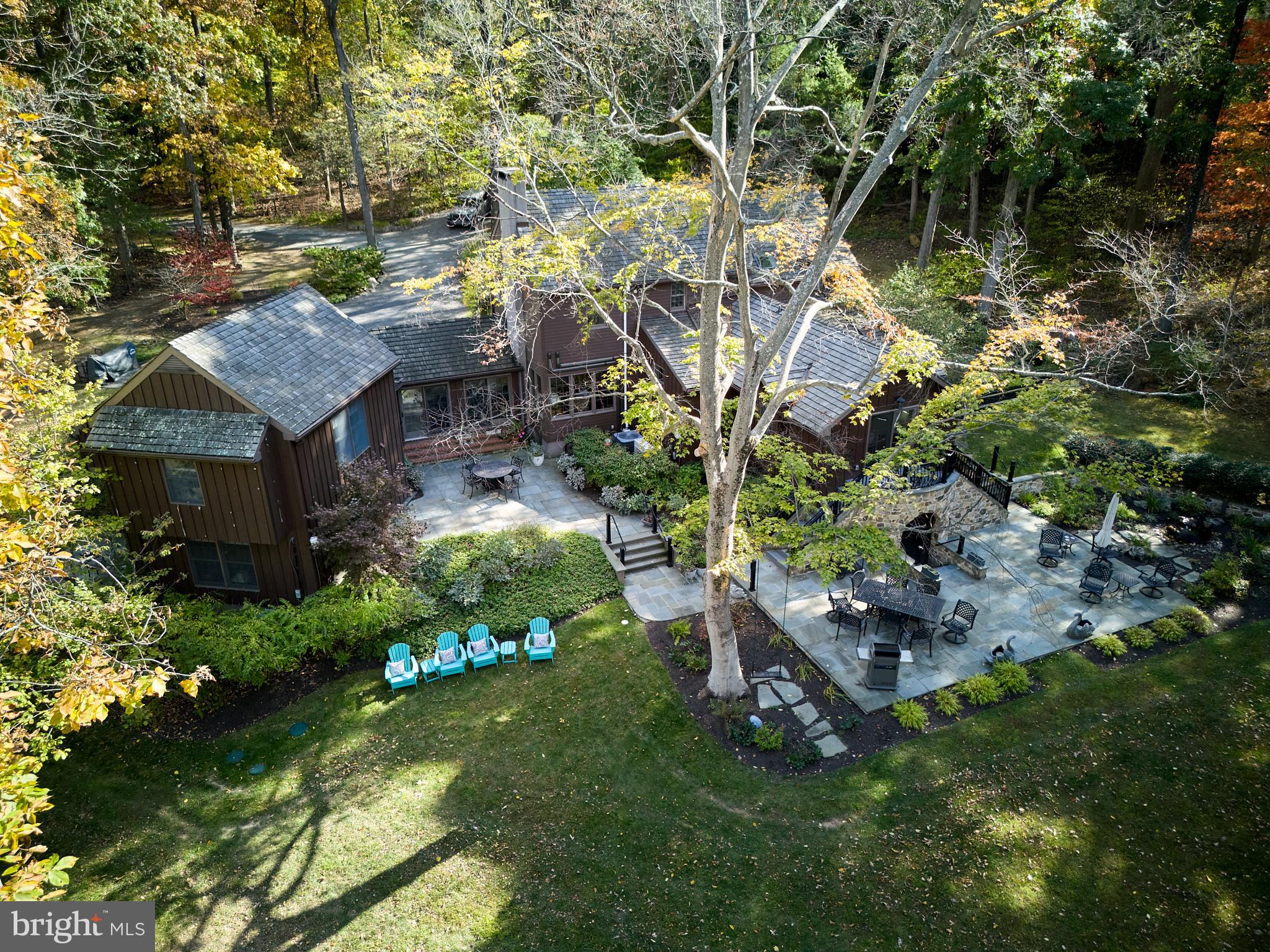 Welcome to 3515 Windy Bush Road, an exquisite residence originally crafted by Earl Jamison of Peddler's Village, now beautifully renovated to blend timeless elegance with modern comforts. A long private driveway sets the scene and welcomes you to your 4-bedroom, 5 -full bathroom haven situated on 3 acres. The current owners have tastefully added extensive hardscaping, including stone patios, terraces, a serene water feature and beautiful landscaping. Ensuring glorious views throughout every season.
The inviting foyer, adorned with an original stone wall, sets the tone for charm and relaxation throughout the home. Here you are introduced to the remodeled kitchen, where white cabinets and a large center island provide an ideal space for culinary creations. High-end appliances and an additional wet bar area elevate the kitchen's functionality. The spacious breakfast or dining area offers stunning views of the wooded property and gardens. This level flows to hallway and the newly added primary en suite. This spacious bedroom includes a custom vanity area, sitting area and not to be forgotten double doors leading to a private outdoor escape for morning coffee and a breath of fresh air. The primary bathroom with custom cabinetry, quartz countertops, and radiant heated flooring, keeps you feeling like you are on a spa retreat. This level also includes a separate full bath, spacious laundry room and side door exit to the enclosed English garden.
Join your company in the family room, where old barn beams, a wood-burning fireplace, and large windows allow the outdoors to seamlessly blend and set the mood. The second floor offers two spacious en suites, with hardwood flooring throughout and custom finishes.
Transitioning to the additional wing is perhaps the perfect place to curl up and read your favorite novel. Spacious and bright, with a brick floor and outdoor views. This area leads us to a seperate entrance, and is currently permitted as an airbnb. Imagine your guests with this gorgeous living area, small kitchenette-like space, and their own laundry area. With a large bedroom and full bath, this private space makes anyone feel as if they are on vacation.
This elegant residence combines modern comforts with rustic allure, ensuring a tranquil and luxurious living experience.
With New Hope, Lambertville, Peddler's Village and surrounding towns at your finger tips, your choices for art, culture, dining experiences, & excursions are never ending