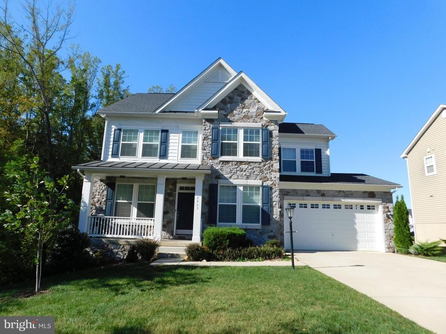 This charming colonial is waiting for you!  Located in the beautiful community of Marshall Grove Estates, where pride of ownership is top notch, this home is sited on an outstanding lot.  The home offers 2,274 sq.ft. of finished living space on the main and upper level, with an improved basement that is mostly finished.  The main level features an office, formal dining room, powder room, and a fully-equipped kitchen with granite counter tops, recessed lighting, an island/breakfast bar, and breakfast nook.  The kitchen is open to a large family room where you and your guests will have plenty of room to relax and enjoy a game or movie on a bid screen tv.  The upper level of the home features 4 bedrooms.  The owner's suite offers a ceiling fan, walk-in closets, and a private bath suite with a jetted tub.  A full hall bath and laundry are also located on the upper level.  The lower level features a spacious family/recreation room, a full bath, and a nice storage room.  This level also provides a level, walk-out exit to the rear yard.  Priced to sell, this home will not last long.  Be sure to schedule your showing as soon as possible and make it YOURS!