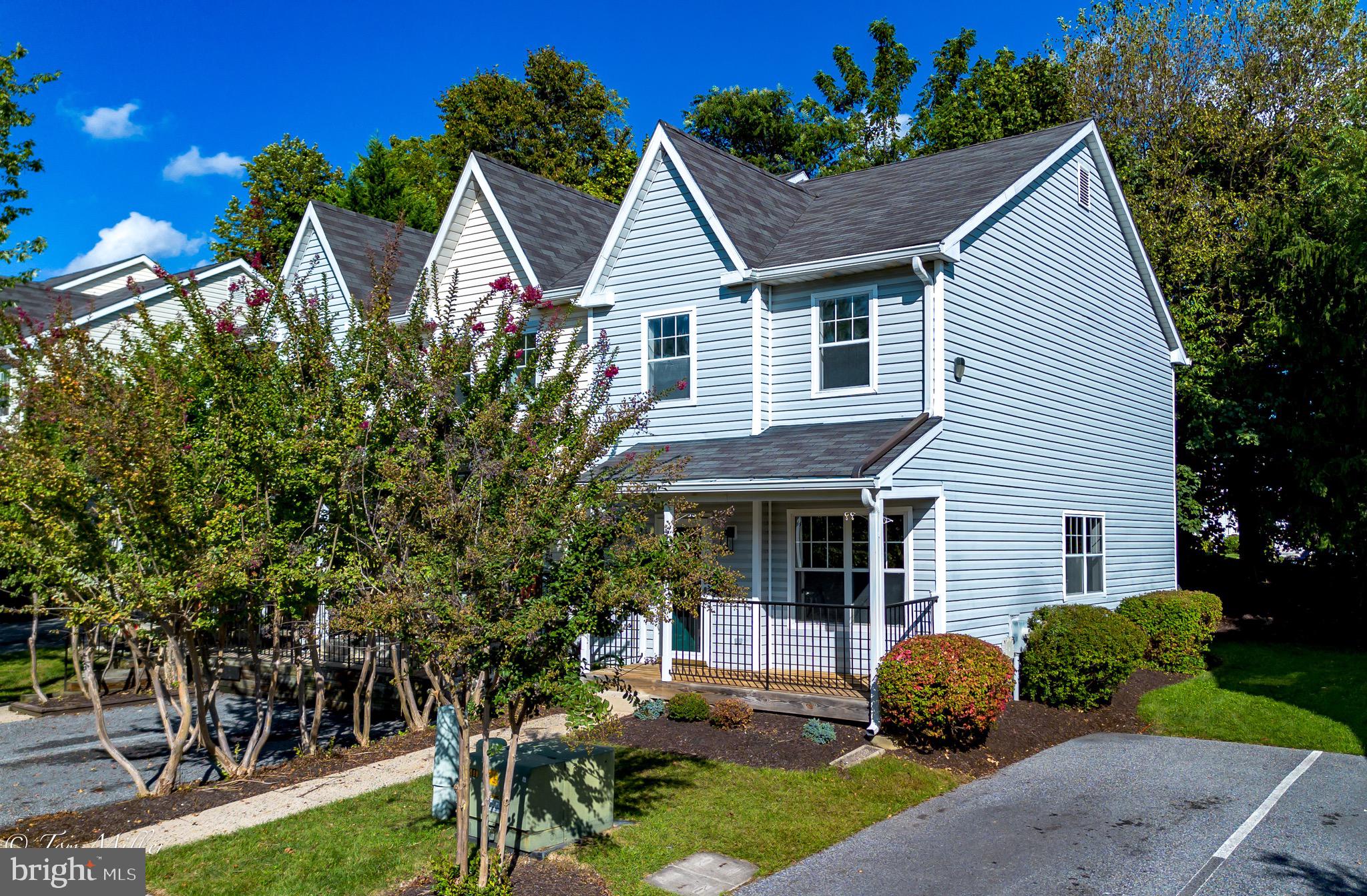 Beautiful 3 Bedroom, 1.5 Bath end of group townhouse . Freshly painted, new flooring through out. Carpet upstairs and lower level. Luxury vinyl flooring 1st floor, kitchen and powder room.Fully finished lower level. Rarely available in the quiet community of Harris Hill. One side note! The rear deck and decks in the community are under review by the Harris Hill Condominium association . Please see letter dated 8/15/2025 in seller documents.