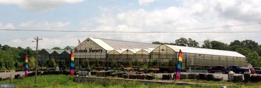 Garden Center with over 33,000 sq ft under roof. Inventory and business aspects will be sold separately.  Business in open and going strong. 3 lots totaling 7.85 acres. Lots 76-A-62., 76-A-63 and 76-A-65.