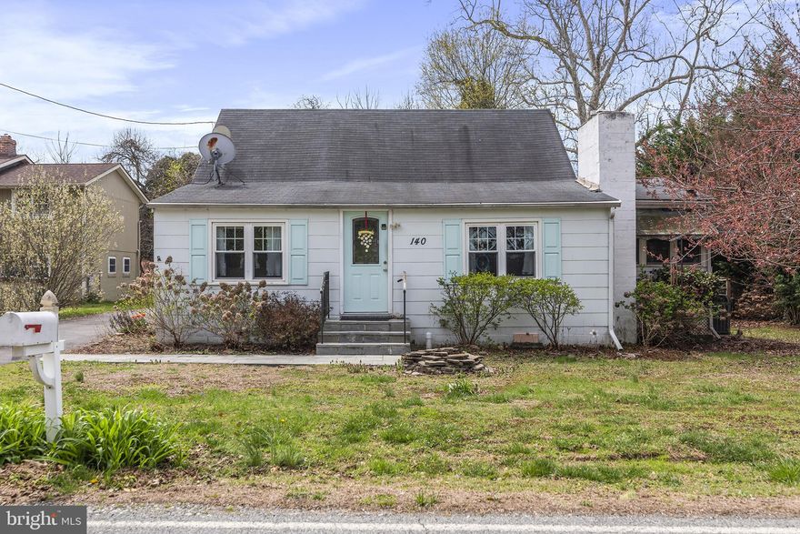 Adorable two-bedroom cottage in the water-oriented community of Hollywood Beach with a two-car garage is ready for new owners. This fabulous home has the necessary updates for full or part-time living. Are you looking for a water-oriented 2nd home with beach, clubhouse, boat ramp, pier, and slips... this is the place. This lovely home has hardwood floors, a beachy color palette, a living room with a fireplace, a sitting room, and an awesome sunporch with a fireplace. Many updates include a reinforced crawl space with vapor barrier, an updated electrical system (200 amps) & updated plumbing. The hot water baseboard heat is cozy, and the Boiler was replaced 15 years ago. Hot water heater replaced in 2020. Well pump, well & septic replaced in 2010/2011. The community HOA fee is $677 for full-time living; the fee includes dues, trash/recycle/yard maintenance, beach access, clubhouse use, boat ramp access, and swimming area. Boat slips with lifts are available for an extra fee of $450 annually.