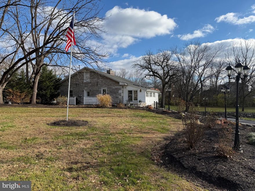 Beautifully updated, unique, and historic stone home on a gorgeous 1.7 acre lot!... originally a flour & grist mill built by Abraham Long in 1832. This one of a kind property has so much to offer... Interior features an open floor plan that is great for entertaining. Remodeled kitchen with  cherry cabinetry, hardwood flooring, granite countertops, island, recessed lighting, built in wine rack, and adjoining dining area. Great room features a beautiful floor to ceiling stone fireplace with built ins, hardwood flooring, and a sealed well that looks down on the water flowing thru the millrace under the home! Primary bedroom suite features a 16' x 6' WIC, a  beautifully remodeled bath with  custom tiled shower, custom wall tile, soaking tub, and chestnut LVT flooring. There is a family room  with skylights and an adjoining office/possible 4th bedroom on the 2nd floor. Stone walls are 2' thick. The beautiful 1.7 acre lot has a cleared meadow between the Quittapahilla creek and the millrace, with amazing views of nature from the 24' by 30' flagstone patio. Updates include new 50 year roof & 6 skylights installed in 2022, new paved driveway with parking for 7 cars, and much more! EZ to show!