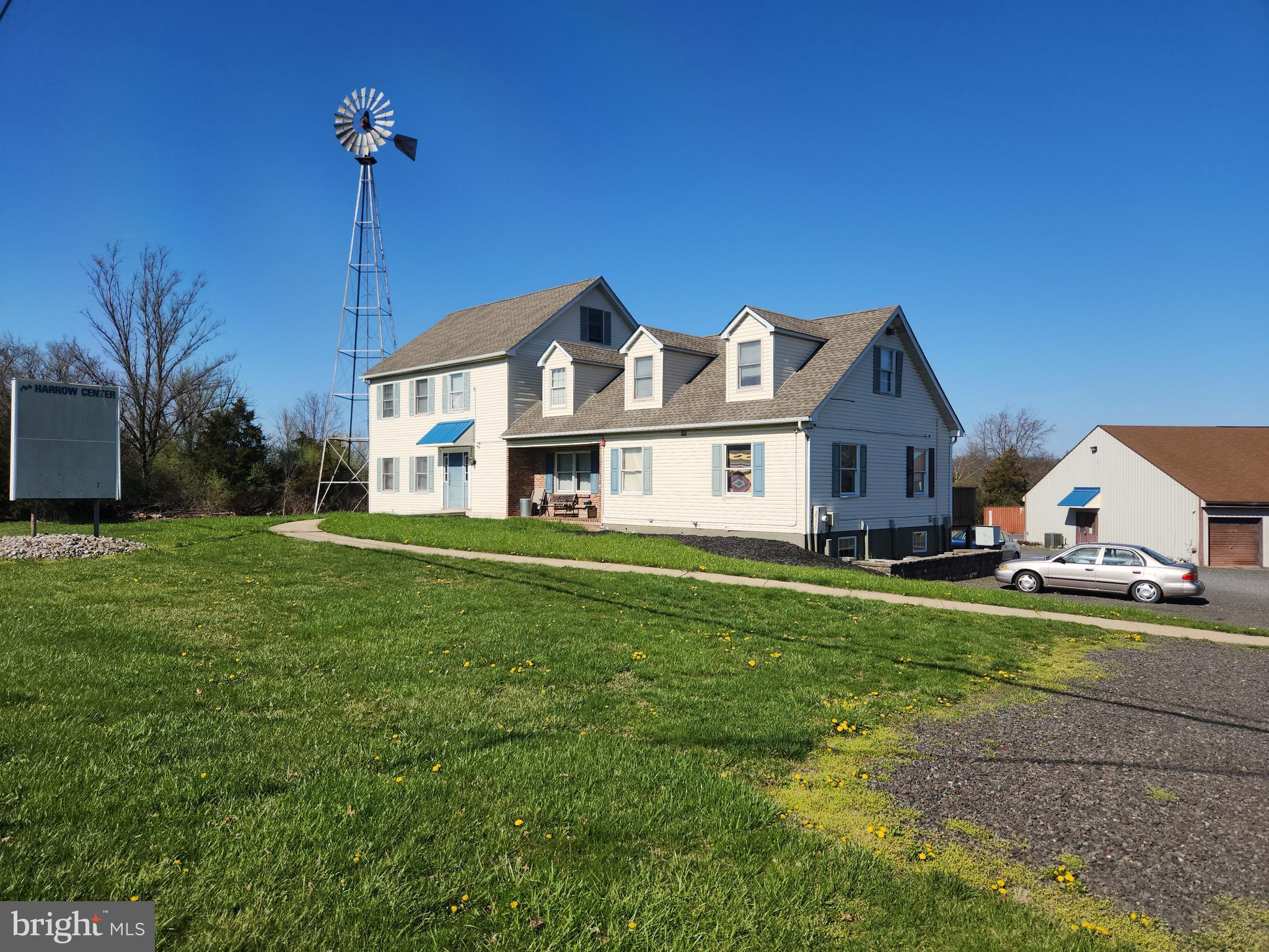 Incredible opportunity to own your own property for your business & collect income at the same time. Daily traffic count 14,000. This property has 4 residential rentals & 1 office space that could possibly turned into a 5th apartment or stay an office for your business. This property also has a large warehouse in the rear of the property that contains 4 24 x 24 workshops with 14 ft doors, 8 secure garage bays 12 x 22. The 3 bay garage has electric, propane heat with lots of parking. The building measures 50 x 50 ft with approximately 16-foot ceiling height and a concrete floor. All of this surrounded by an extensive parking area.