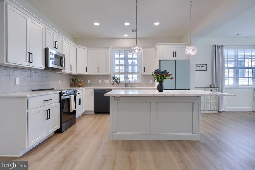 Newly built in 2024, this upgraded 3 bedroom, 2.5 bathroom Cahill model by Murry Homes offers comfortable, low-maintenance living in Millersville’s Bellaride-Crossgates community. Showcasing a bright open floor plan with luxury vinyl plank flooring, updated lighting, quartz countertops, and abundant natural light throughout.
The kitchen is a perfect place for entertaining, featuring Calacatta quartz countertops, large island, stainless steel GE appliances, Samsung Bespoke refrigerator and updated hardware. It opens to the dining area and living room with a gas fireplace featuring a Kenwood mantel, along with sliding glass doors that lead to the outdoor patio—an inviting space for entertaining or relaxing. 
The main level primary suite provides a private retreat featuring a walk-in closet & ensuite bath featuring double vanity, tiled walk-in shower, and a decorative beadboard accent wall.  
The upper level includes a spacious second family room with a large walk-in closet for additional storage needs, a bonus flex space with vaulted ceilings, two additional bedrooms with carpet floors and double door closets & a full bath.  
Additional highlights include main level laundry, window treatments throughout & 2-car garage with storage space. Located within the Crossgates HOA, which covers lawn care & snow removal. Convenient to Crossgates Golf Club, Millersville University, walking trails, shopping & dining. Schedule your showing today!