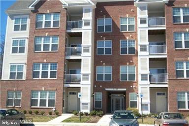 Beautiful move in ready Condo*2 BED, 2 BATH**Gas Fireplace**Modern Kitchen with Breakfast Bar1 Year old HVAC, brand new hot water heater, Samsung front load washer & dryer; **Elevator Building**Permit Parking**Just over MD/DC line**Great Commuter Location**Easy Access to 95/495/695/Pennsylvania Av. This home is in the much desired commuter location of District Heights with easy access to the 95/495 Beltway, Andrews AFB, Bolling AFB & minutes away from Washington, DC. The layout is excellent in this 2 bedroom / 2 bath home with a view of the community playground. This home features some of the best finishes you can get, but also comes with extras. The owner added a custom custom hardwood floors throughout the entire space to match the beautiful kitchen cabinetry. The listing agent is related to the seller.