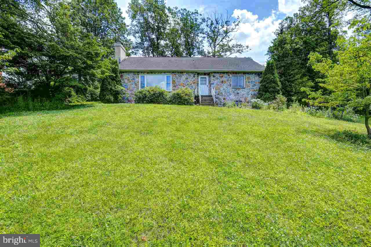 This beautiful home has only had one owner since it was built in 1962 and it shows pride of ownership. There also has been no smoking or pets in the home. Some of the great features of the home are the wood floors, spacious rooms, fireplace and privacy. Don't dismiss this property online, this is a MUST SEE! Office on Second floor could be used as a 4th bedroom.