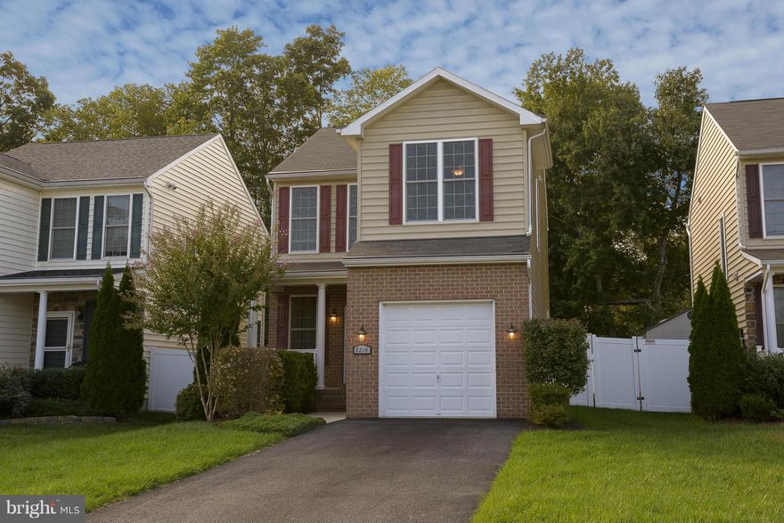 NEWER REDUCED PRICE***BACK ON THE MARKET***BEAUTIFUL MOVE-IN READY 3-BEDROOM, GORGEOUS KITCHEN WITH STNLESS STEEL APPLNCES AND GRANITE CNTRS, BRIGHT, SPACIOUS LIVING ROOM WITH FIREPLACE, HARDWOODS, MASTER WITH WLK-IN AND DUAL-VANITY MASTER BATH, CONVENIENT UPSTAIRS LNDRY, LARGE BASEMENT FAMILY ROOM, FENCED-IN BACKYARD, GARAGE, CLOSE TO FT. MEADE, MAJR HWYS, SHOPPING.  ACT NOW!